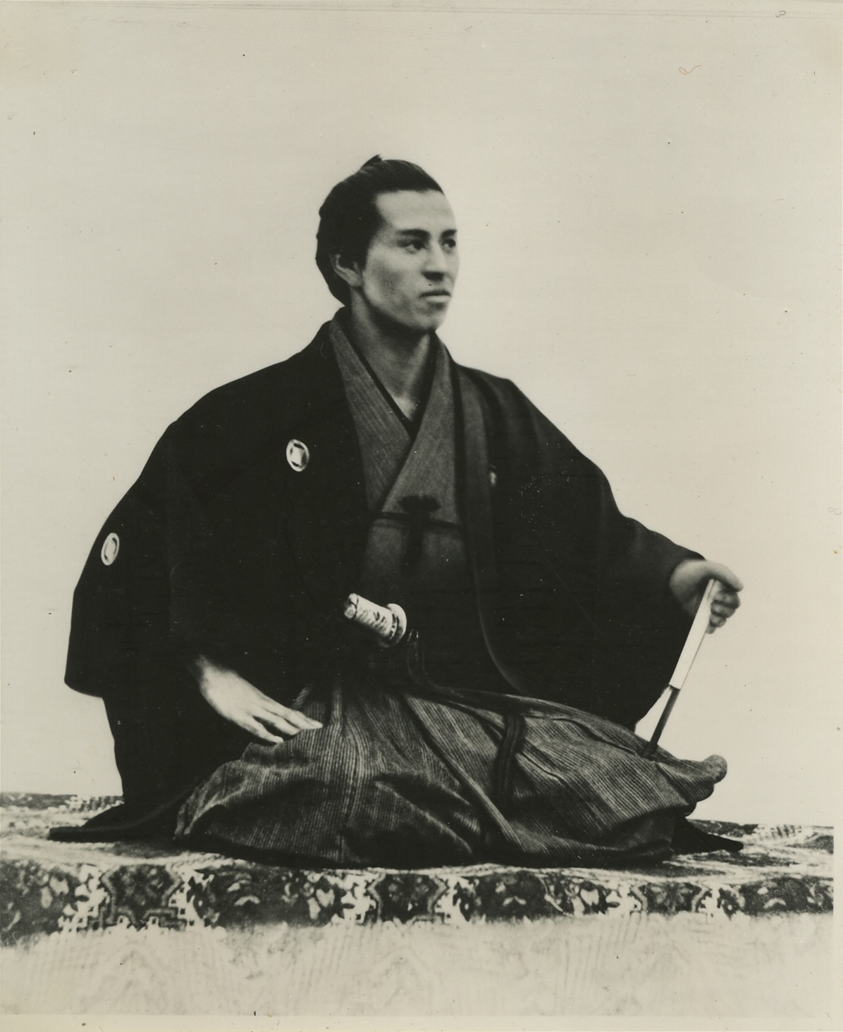 Taken in 1873, this is a photo of the commended workers who had assisted the preservation of the Matsumoto Castle